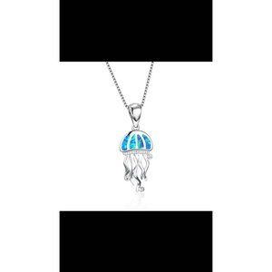 Fire Opal set in .925 Silver With Crystal